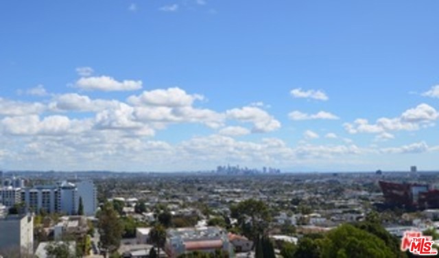 999 N DOHENY Drive 1208 West Hollywood, California This is the corner unit Buyers dream of one day being able to purchase! Adjoining unit is also for sale by same owners and may be combined! Sellers spared no expense in converting this amazing upper floor location into a dream home using the finest available finishes & fixtures. Fleetwood stacking doors, seamlessly engage the spectacular, mesmerizing views while stepping out to the private 18ft. ft corner balcony which features imported Honed/Chiseled Marble tiles. Remote controlled blinds; Dornbrachet, Gaggenau, Armony Italian Double Lacquered & lighted cabinetry features an induction Island stovetop Please view attached list for specifics as well as the video by clicking on the camera icon above. EZ to show.