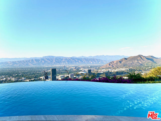 7833 Torreyson Drive, Los Angeles CA: https://media.crmls.org/mediaz/968b5909-8e65-46fb-9275-59a78b5a15be.jpg