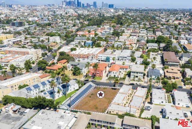 1153 S Bronson Avenue, Los Angeles CA: https://media.crmls.org/mediaz/96aa0514-bf59-4bdc-a9fa-8d71bfd26d32.jpg