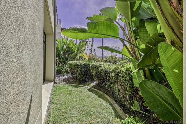 Green space beyond patio (common walkway)