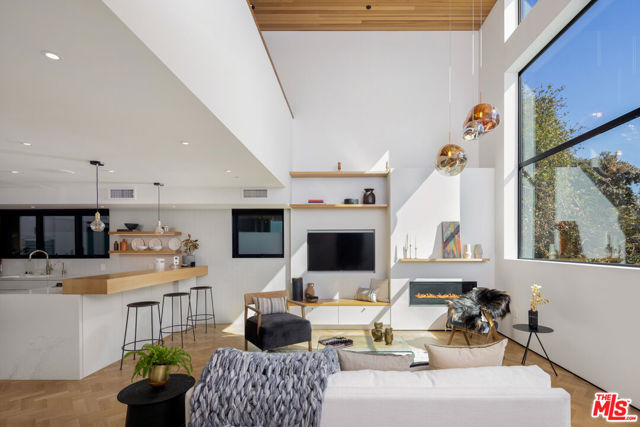 303 Windward Avenue Venice, California One of the most beautiful opportunities in Venice! This custom architectural masterpiece w/ a 2nd unit/studio designed by Robert Thibodeau of DU Architects is unrivaled and nested in a premiere location. //About this home: Step into this soulful home completed with the utmost attention to detail and finished in 2020. Indulge in every detail as you enter into the main level with soaring windows running the length of the second story, a fabulous chef's kitchen, and meticulously crafted hardware and lighting. You will find admiration in the soaring cedar ceilings, Ann Sacks tile-work, the solid oak herringbone hardwood floors, and Portola Roman Clay Gypsum walls that guide you to the second story while taking in all the artistic details. Upstairs you will be drawn to two spacious bedrooms and a loft/den perfect for your home office! An expansive, luxurious master retreat that encompasses the entire third floor with a cedar sauna and deck with views. //We Love: The spacious, and perfectly finished legal 2nd unit. This gives you the flexibility to occupy the entire property as your compound, live in one unit, and rent the other, or live in the main house and use the other unit as your creative haven, or for family and friends. A large 2 car garage and exterior spaces offer ample parking. Seconds to the beach and just off Abbot Kinney, you are in the heart of Venice, there is nothing else like this!