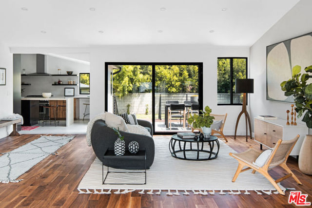 612 Boccaccio Avenue Venice, California Stunningly remodeled home with a brand new swimming pool/spa and a big, grassy back yard in President's Row - what more could you want? Entertaining is easy here. A wide open floor plan allows for much mixing and mingling, or having a cozy Sunday snuggle. Warm walnut floors, a kitchen any HGTV chef would covet, a back deck spacious enough for dining and lounging... and that pool! A 'studs up' remodel, all of the home's systems are new. The primary bedroom, with a separate entrance to the back yard, has a spacious pass-through closet, and an en suite bath boasting separate vanities, a deep soak tub and walk-in glass shower. Both guest bedrooms have generous closet space and share a spacious jack-n-jill bathroom. Vaulted ceilings in the main living areas lend a sense of volume, and lots of windows let in lots of natural light. The detached garage is perfect for parking or as additional flex living space. Located just a block off of Abbot Kinney, you're close to all of its shopping and dining, and getting to the beach for a spectacular sunset is so easy...