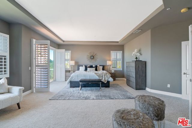 16790 Calle De Catalina Pacific Palisades, California Immerse yourself in the tranquility of this spacious 5 bedroom home, set on a corner lot in a gated street in the Palisades Highlands. The floor plan has been particularly well designed with 4 bedrooms, 3 bathrooms and a laundry upstairs, and a 5th bedroom / office downstairs. Double front doors, high ceilings, large rooms, abundant natural light and lovely white shutters complete the picture. The generous Primary Suite provides a private retreat with ocean and mountain views, a fireplace, seating area, and a balcony. This home comes with a small garden and access to the Summit Club, where members can enjoy the pool, gym, children's playground, tennis courts, Summit Park, weekly yoga sessions and community events.