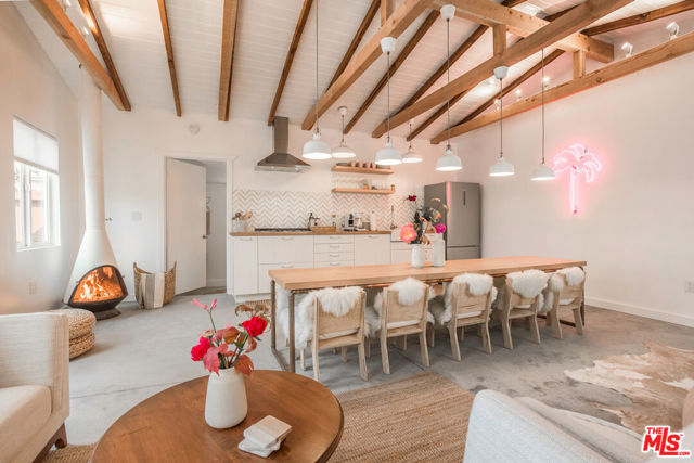 718 Vernon Avenue Venice, California Experience the true essence of Venice Beach living with this exceptional Triplex. Its alluring features, including private hot tubs, a serene communal garden, and a prime location, culminate in a coastal haven that harmoniously blends lifestyle and income. Whether you're an investor seeking a profitable venture or a homeowner seeking a retreat to call your own, this property is an opportunity that cannot be overlooked. This Triplex is a turn-key Airbnb short-term rental, ensuring it's ready for seamless occupancy and an immediate revenue stream (can be delivered vacant or with income). Boasting two separate structures, each finely furnished with custom-built furniture, this property features three units with two bonus spaces (all 1+1) that are fully equipped - an oasis of comfort, style, and convenience. This magical outdoor haven features a custom 100ft long pergola adorned with a graceful canopy and an enchanting communal garden area. As an income-generating gem, this Triplex has the potential to yield an impressive monthly income of $17,500. The thriving rental market in Venice Beach and the property's alluring features and prime location make this investment worthwhile.