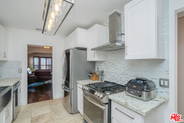 7815 S Halldale Avenue, Los Angeles CA: https://media.crmls.org/mediaz/9992a358-fdec-4704-b62c-f75a2cc78b13.jpg