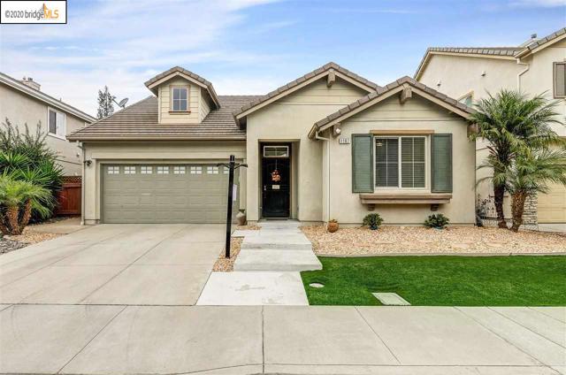 1167 Tropicana Ln Brentwood, California Desirable single story home in the Rose Garden Community. Hard wood floors and solid surfaces throughout. Spacious Kitchen with Stainless steel appliances, upgraded cabinets, and granite countertops. Cozy gas fireplace in family room. Spacious master suite with walk in closet. Large Master bathroom with soaking tub, walk-in shower and double sink vanity. Solid patio cover, stamped concrete, and spa highlight the inviting rear yard. Low HOA dues include community pool, clubhouse and playground. Close to shopping, restaurants and schools. Move-in ready