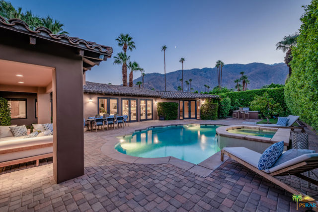 252 Camino Del Sur Palm Springs, California Location, location, location. AND with a 'noted' celebrity history. This property has it ALL. Location: A prime location within Old Las Palmas, one of the most sought-after neighborhoods of Palm Springs. This property is one block from North Palm Canyon Drive and walkable to the Uptown District, the arts and dining district, and its many restaurants, cafes, coffee shops and retail venues. Celebrity History: Yes, this was Cher's Old Las Palmas Santa Barbara style hideaway according to the Los Angeles Times. The Los Angeles Times reported that Cher owned this property and extensively expanded and remodeled it. Cher said at the time: "I've always loved the indoor-outdoor lifestyle you find there (in Palm Springs). We designed this home to capture that feeling". Her expansive custom architectural remodel redesign nearly doubled the original floor plan of the home, all with "Cher-style pizazz". Property Details: 4,015 square feet, 4 ensuite bedrooms, 4 1/2 bathrooms, media room, gorgeous travertine stone flooring in the great room, kitchen, hallways, laundry room, media room and bathrooms. A voluptuous master suite with Western Mountain views from the multiple French doors that lead to the pool and spa, a fireplace, a coffee/wet bar, two walk-in wardrobe closets and a large master bathroom. Chef's kitchen with premium SS appliances, double ovens, granite countertops, stunning cabinetry, and adjacent walk-in pantry. Large two-car garage with extensive built-in storage cabinetry. Electronic gated auto driveway entrance. Private rear patios with inviting saltwater pool and spa - captivating west-facing mountain views and a perfectly located custom built-in BBQ island complete with a large SS gas grill. Furnishings are available outside of Escrow, per inventory.