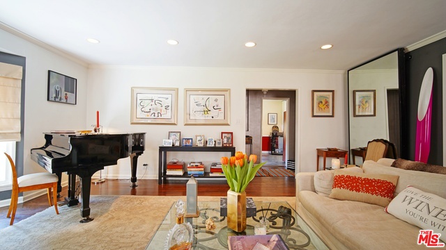 1339 MEADOWBROOK Avenue Los Angeles, California Welcome to your private beautifully appointed, fully updated 1 level home with a charming front porch and a nice large back yard with room to add an ADU or garage conversion. TANKLESS hot water heater and Ring door bell. Featuring gorgeous chocolate hardwood floors a large living room with warming fireplace and a beautiful dining room for big family dinners. The kitchen has custom white cabinetry, stainless steel appliances and a nice breakfast area. There is a Large master suite with a lovely master bathroom featuring a huge JACUZZI bathtub and separate shower fit for a queen. 2 large additional bedrooms share a bathroom and one of the bedrooms in the rear of this lovely home has french doors opening out to a nice elevated deck, perfect for outdoor dining. Located in close proximity to all of LA's best restaurants and shopping.
