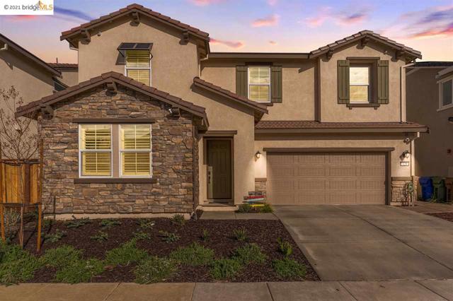 129 Scott Creek Way Brentwood, California BETTER THAN NEW! Why wait for a new home to be built when you can move right into this stunning home that is 7 months old. The sellers have put in over $100k in upgrades for you! Featuring Luxury Vinyl Plank Flooring in the living & wet spaces, upgraded Carpet/ padding, Ceiling Fans, Plantation Shutters. Media Nook off the Family Room is great for school/work from home. The Chef’s Kitchen includes Custom Cabinetry in a subtle grey w/ soft close feature, Granite slab counters, Large Breakfast Bar/ Prep Island, Walk-In Pantry, upgraded Stainless Steel hood and appliances including a Samsung Smart Fridge. Great Loft / Bonus space for extra family room. Huge primary bath w/ spa-like shower & vanity seating. Two additional ensuites. Landscaped rear yard with a custom outdoor kitchen / grilling area. Finished Garage with Epoxy Floors. FULLY PAID SOLAR. NO HOA and Lower tax assessments. Close to several parks and downtown Brentwood. http://listings.nextdoorphotos.com/129scottcreekway/?mls