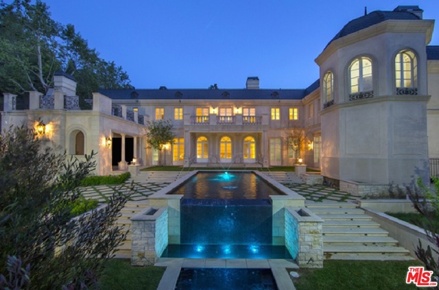 11630 Moraga Lane Los Angeles, California NEW CONSTRUCTION over 19,000 sq' inside Bel Air gates, reflecting detailed sophistication Chateau Philippe II, inspired. Lanai, spa, dramatic fire torches, waterfall, in-ground Infinity pool w/waterfall & manicured landscaping. Louis V Sipping Parlor, guest house, 2 water features, bocce ball, croquet lawn, custom hand-carved finishes throughout. Grand ballrm, game rm, gym, lux theatre, library, cigar rm & wine cellar, 1,271 sq' sound resistant underground bonus rm. Main House w/en suites throughout. Master Suite w/firepl, wet bar, 2 walk-in closets, balcony overlooking grounds & adjacent master bathrm w/water closets, bidet, built-in vanity, porcelain claw-foot tub, state-of-the-art shower w/multiple shower valves, body jets, rain showers & sauna/steam. Gourmet Kitch, Butlers Kitch, Butlers Pantry. 24 thick walls, reminiscent of French Chateau stately homes. Designed, built & finished under direction of feng shui master. Harmonious floor plan creates an undeniable sense of chi.