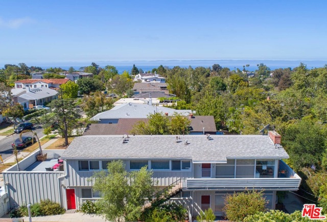 677 Las Lomas Avenue Pacific Palisades, California DOUBLY DELIGHTFUL DUPLEX 2 sun-filled homes for price of 1! PALISADES BLUFFS LIVE+EARN OPPORTUNITY! Choose your enticing sustainable income option: enjoy continuous cash flow x2, or, live in 1+rent other! Charming/delightful duplex w/never-ending income+eternal equity. Lovely greenery+luxuriant outdoor spaces. Upstairs home has expansive treetop+mountain views/wrap-around balcony+huge 19x20 rooftop deck for extraordinary additional living space. Lower unit boasts wrap-around yard+3 sides of windows in living/dining/kitchen. Quietly nestled below Sunset in peaceful 4-street enclave: Bienveneda/Palmera/Northfield/Las Lomas w/Las Casas Loop on 1 side+El Medio Bluffs on other. Both units have SFR feel/ bright move-in cond w/cute kitchen+baths/hdwd floors/ample closets/flr-to-ceil windows/decorative fps/woodbeamed ceilings/garages/outdoor spaces. Minutes to Beach+Palisades Village, convenient to commutes/worship/biking+hiking trails/services/shopping/schools. A darling Duplex!