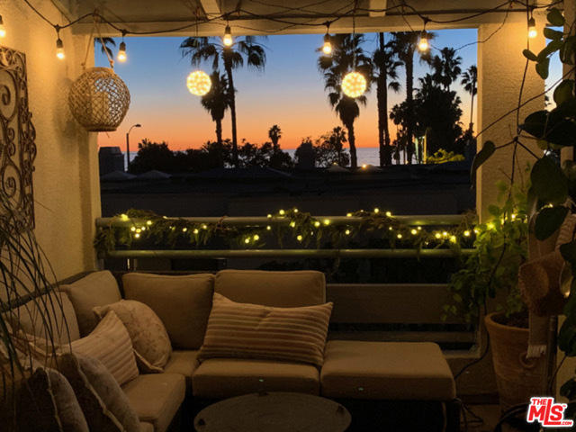 20 Ocean Park Boulevard 24 Santa Monica, California Enjoy romantic sunsets from the privacy of your own balcony!!! Santa Monica retreat with spectacular ocean views directly across the beach...... This sunny, spacious and reimagined to perfection sought-after Sea Colony town-home has it all!...... The main living area has an open floor plan with w/floor-to-ceiling windows providing ocean views from the living room, dining room, den, open kitchen, and balcony. This home has been tastefully redesigned w/ new custom-made wood and tile floors, recessed lighting, wainscoting, base & crown molding, throughout...... The Gourmet cook's kitchen features high-end stainless steel appliances, custom-made cabinetry, secret pantry drawers, and a breakfast bar that flows seamlessly into the den& living room area. .....The 2nd floor offers a luxurious master suite with a large sitting area, fireplace, a large walk-in closet, an ensuite bath, dual vanity w/ Venetian plaster finishes, and a 2nd bedroom suite w/ updated tiled bathroom, Air tub. Other bonuses include 3rd room used as bedroom suite/screening room/ office on ground level, private 2 car garage with direct access, to remodeled laundry room, ample storage, 24-hour guard, pool, spa, gardens, exercise studio, conference room, and tv room, Santa Monica oceanfront living at its best.