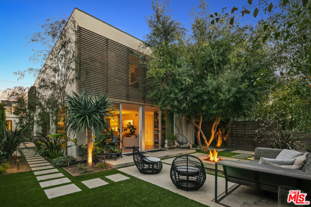 844 Palms Boulevard Venice, California Modern and flexible home in Venice with a chic flair this stunning residence could be your peaceful sanctuary! Architectural details are meticulously intended for an artistic experience. The living room and the dining room are separated by a gorgeous steel staircase, and the kitchen feature stainless Sub-Zero, Wolf and Liebherr appliances surrounded by quartz and wood countertops. The master suite features a walk-in closet, a private bath with a deep soaking tub surrounded by marble walls, plus access to an enviable 800 sq ft rooftop sundeck to provide that must-have indoor-outdoor feel. Off the kitchen is an attached in law-suite for versatility. Surrounded by zen-inspired landscaping, relax in the outdoor entertainment area with a built-in fire pit and pool, an extension of your living space that you see through the floor-to-ceiling sliders. Stroll to Abbot Kinney or the Lincoln Corridor. Come take a tour to see the endless possibilities!