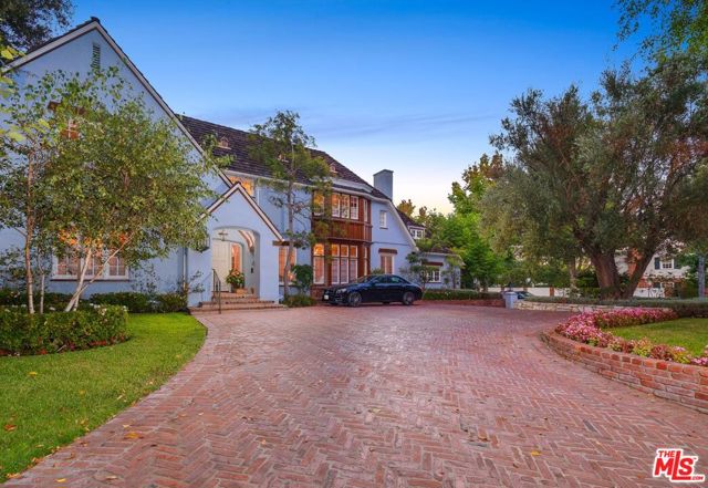 602 N Rodeo Drive Beverly Hills, California Iconic Country English in the heart of the Beverly Hills on arguably the best street in the flats. 5300 sq. ft. Country English home Reminiscent of the English countryside with grand scale rooms; large formal dining room, large formal living room, wood paneled library, hidden speakeasy Billiards room, garden room, large gourmet kitchen and breakfast room, maids and bath complete the main floor. Upstairs is a sensational master suite with a large bath and fabulous closet space, 2 additional bedroom suites upstairs. Fabulous yard with a large pool, outdoor shower, outdoor Dining and pergola with a fireplace, bonus room above the garage all on a 13,677 square foot lot. Sensational flow for entertaining, true center hall plan, walls for artwork this is old Hollywood glamour at its finest and all just minutes from Rodeo Drive shopping. 4 bedrooms, 5 1/2 baths