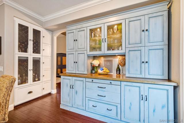 Custom Buffet with an abundance of storage! There is also a custom built-in wine  cabinet!