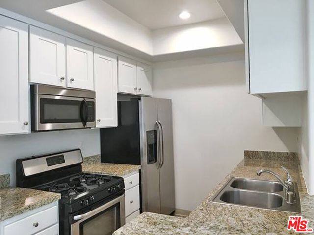 14430 BENEFIT Street, 204 photo 2
