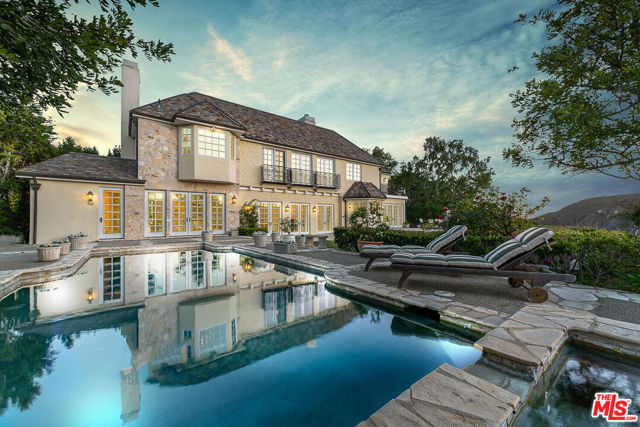 Located in the coveted Palisades Hills section of the Highlands, on a cul-de-sac street, this 9350 Sq Ft flawlessly remodeled French Provincial Masterpiece will take your breath away from the moment you enter the motor court. Set on a tremendously private 22,780 Sq Ft lot, with breathtaking, expansive, canyon & mountain views, this 7 Bedroom, 11 Bath home offers extraordinary moments throughout with almost every room opening onto the magical back yard, perfectly designed for grand scale entertaining. Upstairs you will find a massive Entertainment Room with its own kitchen, gym and bathroom, 5 en-suite bedrooms, including a romantic primary suite with private view balcony and a spa-like bath including oversized tub and shower, fireplace and a massive closet.  Downstairs you will find your grand entry and will be greeted with French Imported Limestone, a beautiful custom gourmet Clive Christian kitchen boasting a timeless Lacanche Range, a separate catering kitchen, office/library, formal living, dining, family room and two en-suite bedrooms, including a private guest quarter.  High ceilings throughout, four fireplaces, 3-car garage, completely private yard with pool and spa, large grassy area, and tranquil, awe-inspiring views.  This home is stunning and is one of a kind.  Palisades Hills rec-center w/pool, tennis courts, basketball court, clubhouse, 24-Hour security patrol, as well as membership access to the private and gated Highlands Park.