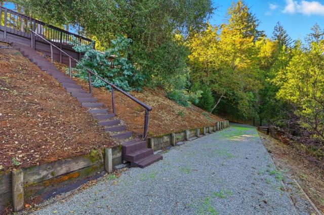 Lower road that brings you to more land on 3.65 acre property.