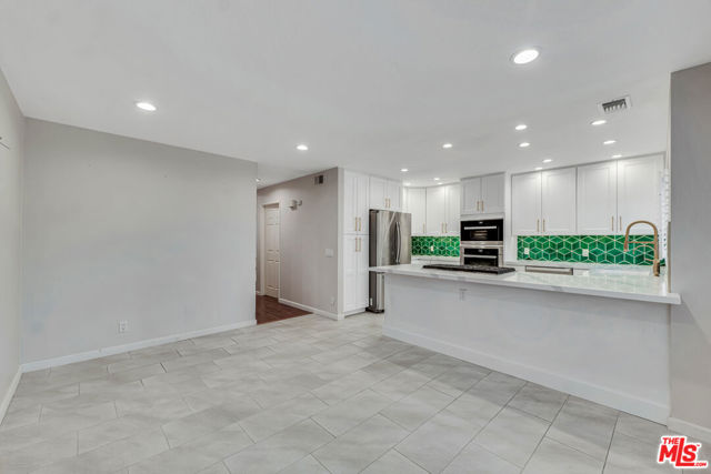 20950 Oxnard Street, Woodland Hills CA: https://media.crmls.org/mediaz/9d24a983-1c91-46f8-a405-2b54ef89adff.jpg