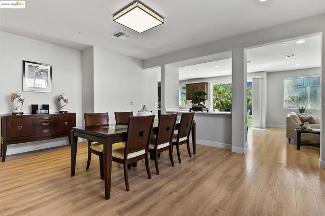 Dining space featuring light wood-style floors and recessed lighting