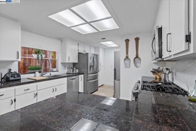 60 W South St, Tracy CA: https://media.crmls.org/mediaz/9d77a590-ea82-4ece-8023-6bef6602ba8b.jpg