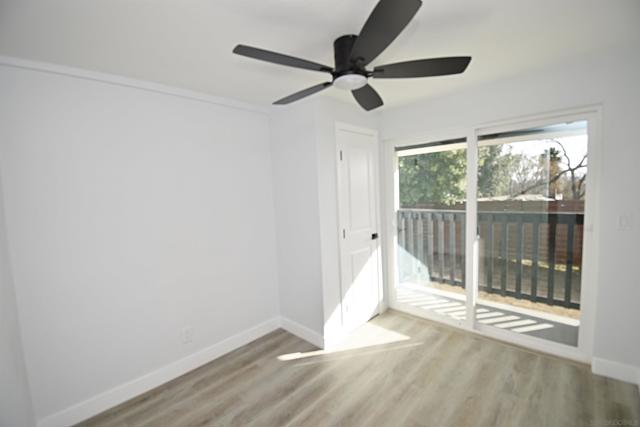 BEDROOM # 3 WITH SLIDING GLASS DOOR AND PRIVATE PATIO