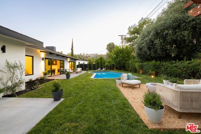 24211 Caris Street, Woodland Hills CA: https://media.crmls.org/mediaz/9eb6b9dc-da31-4b22-94a5-ddda7475ff25.jpg