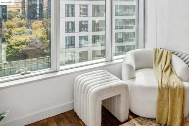Living area featuring wood finished floors and baseboards