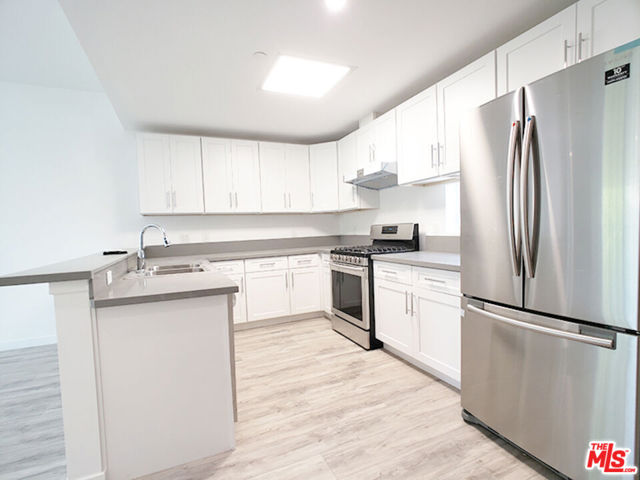 1229 S Kingsley Drive, Los Angeles CA: https://media.crmls.org/mediaz/9f82206b-c6e6-4eb2-b3dc-62885fc7b2fb.jpg