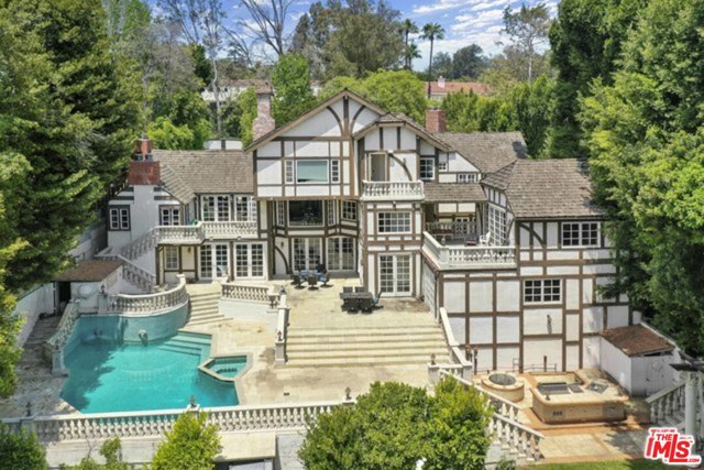 10472 W Sunset Boulevard Los Angeles, California An exceptional opportunity to live in this iconic craftsmans estate, once was occupied by legendary Ed McMahon, awaits its next chapter. At 6,741 sqft atop a20,000 sqft lot in prestigious area of Bel Air - little Holmby Hills. The sky's the limit to create a vision with this magnificent property, This property requires a major repairs or updates you can re-build your own or remodel to a new polished look. Surrounded with abundant greenery, open courtyard, amazing pool and a unique custom water fountain to suit your lifestyle. This location truly represent luxury living surrounded by the best of Beverly Hills and Bel-Air where influance and beauty featured throughout.