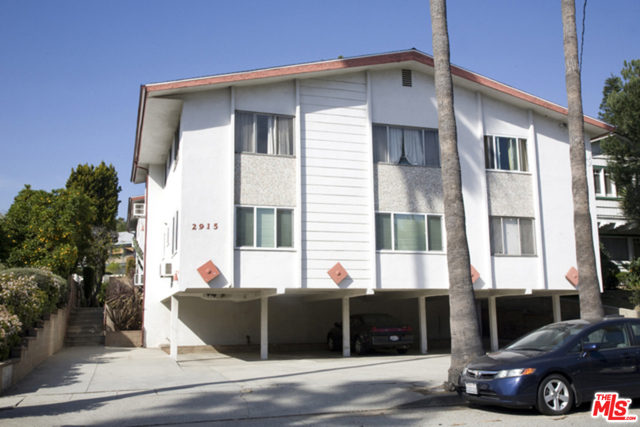 2915 St George Street 7 Los Angeles, California Charming and bright one bedroom top floor condo with gorgeous hardwood floors, cool vintage kitchen and bath, and dining room that opens to both the living room and kitchen. The large bedroom has spacious closets and an alcove that would make for a perfect office area or reading nook. This mid-century courtyard building has an intimate feel, with only 8 units, and is conveniently located near the best of Los Feliz and Silver Lake (not to mention Gelson's and Trader Joe's!). There is also a community patio and BBQ, and your own front patio area.