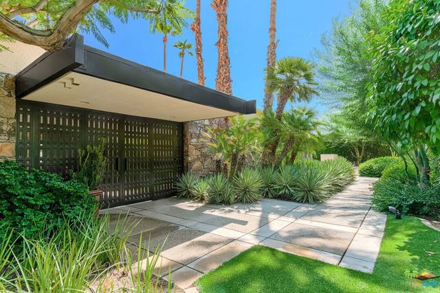 70170 Sonora Road Rancho Mirage, California The Kassinger House in Thunderbird Heights in Rancho Mirage was commissioned to Donald Wexler, AIA, by the Kassinger Family to create the ultimate Desert escape. It is on the City of Rancho Mirage Register of Historic Places, and has the tax advantages of The Mills Act. Unassuming from the street enter down the garden path through custom one of a kind wood gates to reveal a garden sanctuary. Double door entry will reveal the commanding views of the mountains and surroundings as this property is on one of the highest streets in guard gated Thunderbird Heights. With roughly 5351 square feet and .60 acre lot the imprint and characteristic features of Wexler are apparent from the use of steel and glass and overhangs supported by the "spider leg" posts. The expansive open living area with fireplace and bar expose the floor to ceiling glass and large veranda outdoor areas with sparkling pool and spa below. The primary bedroom wing features two bathrooms, two large walk in closets, cedar closet and separate den/office area looking to the private inner garden. The large centralized kitchen is shielded from the other communal areas of the home which was of the era when the property was built. The dining area has floor to ceiling windows on two sides and while open to the other communal areas provides an intimate experience. Flanking the kitchen is another den with direct access to the outdoor living vignettes and BBQ. Two other guest suites in the main house as well as a powder room and large interior laundry area. Attached to the property is also a one bedroom guest house with private living area and separate entrance. This property is a hidden gem that many are unaware of and is just waiting for the next steward.