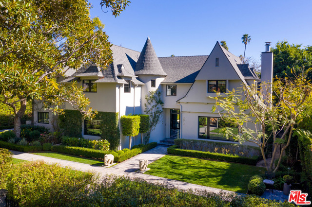 2012 La Mesa Drive Santa Monica, California On magnificent tree lined La Mesa Drive,"The jewel of Santa Monica," this contemporary manor is gated and private. Retaining the grand architecture of an Early Santa Monica Mansion, this lushly landscaped, completely redone residence offers the best in today's amenities. French doors open to the backyard with pool, spa, lounging area. Dining patio and children's play yard invite effortless gatherings. A welcoming entry hall leads to the living room, music room and formal dining room. Everyday living finds itself in the chefs kitchen, adjacent to the terrific family room with a screening area and a large informal table right next to the wine closet and pantry. Off the family room is a wonderful office. 5 bedrooms up connected by a grand hallway. The sixth bedroom is on the first level. 3 car garage, gated driveway, security/cameras, smart home outfitted. Close to Brentwood Country Mart with its local charm, wonderful restaurants and shops. All furnishings may be purchased separately. www.2012lamesa.com