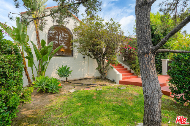 3215 Lowry Road Los Angeles, California A classic Mediterranean style home. Centrally located in Los Feliz. Offering three bedrooms, two baths, a formal dining room, a very charming breakfast room with built-in Cabinets. There's an original decorative Living Room Fireplace. Both the living room and dining room feature beautiful in-layed Mahogany trim detailing border. This single-level home is a must see. Great yard with room to expand or for adding a pool. Or, a clean canvass ready for a Master Gardener's touch. At the end of a very long driveway, a converted 'Barn-Style' Garage could easily be a Studio, Gym, or ?? Minutes to the trailheads of Griffith Park and to all of the shops and restaurants in Los Feliz Village.