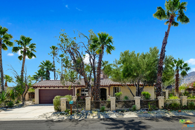 2195 E Wayne Road Palm Springs, California Being sold by the original owners, this immaculate and charming home offers 4 bedrooms and 2 bathrooms. Saltillo tile flooring, with beautiful tile inlay, gives this home a warm spanish feel. The living room is accented with a gas fireplace and beamed ceilings. Both front and back yards feature a variety of trees, plants and cactus for the gardening enthusiast. On a large lot, buyers will have room to add a pool if they desire. New copper plumbing installed 2 years ago.