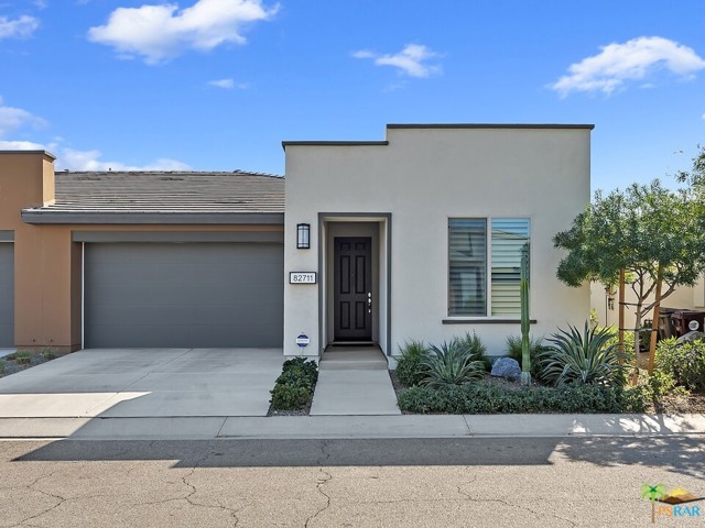 82711 Rosewood Drive Indio, California Located in the spectacular community of Trilogy at the Polo Club, this spacious, open concept 2 bed/2 bath home makes a perfect full or part-time residence in the desert. The home boasts high quality upgrades throughout: quartz countertops, stunning backsplash, composite sink, plank floor tiles and GE profile stainless appliances. The master bath has dual vanities, gorgeous shower and walk-in closet. Guests enjoy a generous bedroom with plantation shutters and full bath. The extra office space has built in desks and cabinets. Full size washer and dryer; tankless water heater. Sip on your favorite beverage while taking in the beautiful views of the Santa Rosa mountains from your back patio. Optional Clubhouse Membership transfer available for a fee of $1875 (vs. new membership is $12,500!) + $167/ mo. to allow you to enjoy the swimming pool, spa, fitness center, concierge, game room, art room and other amenities at the clubhouse as you get to know your neighbors and make the desert your home.