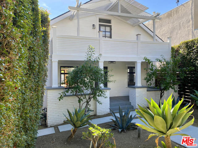 9014 Harratt Street West Hollywood, California Incredible private compound perfect for a work from home owner-user to live in the front unit and use the other 3 units as offices, or for development purposes on one of the biggest lot in Norma Triangle! Rare opportunity to acquire a 4-unit residential compound on a large, private lot in Sunset Plaza, steps from the Edition Hotel. Gated & secure for privacy, the property features 3 detached buildings with a total of 4 units - a two-story, 3-bed + office main house with 1920's Craftsman architecture w/private driveway, front porch and backyard with plenty of room for a pool; a separate detached 2-bedroom house w/open floor-plan & private backyard; and an additional detached duplex containing two 1BD/1BA units. Downstairs unit comes with private front yard while the upstairs unit has a private front balcony with magnificent views of Downtown. This comfortable, chic urban hideaway is set on lush, park-like grounds featuring mature palm and lemon trees. 3 units delivered vacant and 1 unit is tenant occupied. Tenant's unit will not be shown until after offer acceptance.