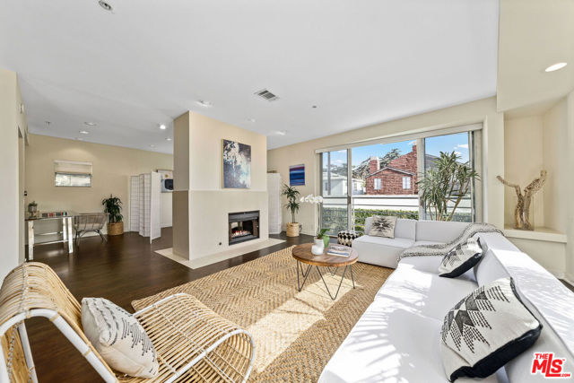 943 14Th Street 4 Santa Monica, California Welcome home to your own private paradise in the heart of Santa Monica, moments away from Montana Ave, Palisades Park, and the beach. Stunning architectural penthouse in an intimate 4 unit complex with private patio and heated pool. Filled with light and ocean breezes, this spacious 3 bedroom/2 bath home with large windows, sliding doors, and soaring ceilings, is an oasis of calm in the city. The sprawling master bedroom flows into an amazing 400 SF wrap-around deck, perfect for your morning brunch, sunset bbq, or an ideal backdrop for your next zoom meeting. Bonus features include smart home suite, recessed lighting, remodeled gourmet kitchen and baths, refinished hardwood floors, washer/dryer in unit, walk-in closet, and electric blinds in the main bedroom. Minutes from Whole Foods, restaurants, and cafes on Montana. Inside the coveted Franklin School District.