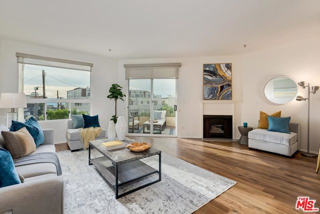 255 Main Street 207 Venice, California Welcome home to this fantastic beach sanctuary 1 block to the sand and stunning sunsets located at the Santa Monica & Venice border. This bright and airy west facing end unit is one of the best locations in this complex with an open concept living room, dining room and kitchen well-appointed with stainless steel appliances, gas range and a breakfast bar. Filled with natural light, the living room features a lovely partial ocean view and a balcony with cross breezes while overlooking a lush garden. The serene master boasts a private balcony, abundant closet space, tranquil bathroom with dual sinks, and a deep soaking tub. Designed by Johannes Van Tilburg & Partners, this relaxing resort style living includes a pool, spa, spacious sundeck, Zen garden, controlled access, 2 side-by-side parking spaces in gated garage, storage and guest parking. Situated in the Silicon Beach and Ocean Park areas, enjoy the best of beach living plus parks and bike paths nearby and shops, cafes and gourmet dining on Rose, Main St and Abbott Kinney. A must see!