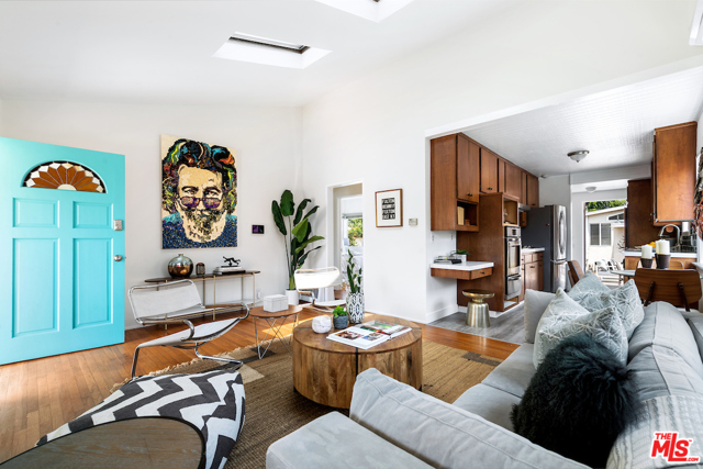 2818 Clune Avenue Venice, California Incredible opportunity to own a prime canals adjacent location! The storybook home of acclaimed artist Laura Kimpton featuring her iconic 'LOVE' word sculpture and original works. This beautiful and enchanting 2bd/1ba traditional is the perfect hideaway for anyone desiring something special and proximity to Abbot Kinney, Washington, Marina and beaches. Updated single story living with ample gated outdoor space as well as a delightful detached creative studio. Work and play from home. There are plenty of outdoor entertainment areas on the large lot over 5,000 sqft. Updates throughout including kitchen, bathroom and two wall A/C units keep this sun-kissed cutie cool in the hot summer. Completely unique and overflowing with warmth and charm. Offering rarity and an unrivaled location, this is the perfect home to further update or develop to your artistic vision. 'All you need is love.'