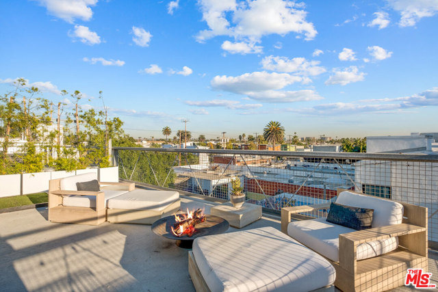 615 HAMPTON Drive C304 Venice, California Designer done live/work loft in one of Venice's most desired buildings. Just 2 blocks from Abbot Kinney & Rose Avenue and Main Street & the beach, this 2-story gem is one of the largest floor plans in the Venice Art Lofts. Flooded with sunlight, this stunning home features soaring gallery walls, large windows, a recently remodeled kitchen, concrete & hardwood floors, an elegant marble primary bath, and so much more. Downstairs den has been converted into a bedroom. With a private rooftop deck with expansive views, 2 secure covered parking spaces, and an abundance of style, this Venice Art Lofts offering is a prime opportunity.