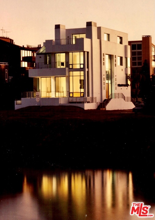 5502 Pacific Avenue Venice, California A rare offering at the beach. Luxurious contemporary waterfront elevator home. Ideally situated at the end of the peninsula offering main channel, grand canal and ocean views. Soaring ceilings beautiful architecture with gorgeous 2 story Living rm. Floor to ceiling glass enhance the indoor outdoor feel. A cooks kitchen with custom concrete counter tops, massive mitered corner windows, and bold center island. Wrap around roof decks to take in the ocean views and boats passing by the channel. Primary bed room with water views and floor to ceiling windows. Primary bath with jade stone and custom glass. 2nd and 3rd br with big window views to greenery and water. Basement level with separate kitchen, living area and bath. 3 car gar + extra parking. Open and spacious with still separation of space for privacy. The home is immaculate, do not miss