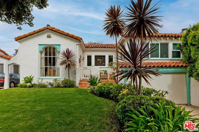 1025 Cedar Street Santa Monica, California Living the dream! Bike to the beach! Enjoy trendy new restaurants! Marvel at good public schools! Easy access freeways! Whole Foods just a few blocks away! A special property in a lovely Santa Monica neighborhood, this1927 Spanish offers the charm of that era with the upgrades of a lovingly maintained home. Inviting front courtyard leads into a beautiful living room, huge arched window and fireplace; Step up to the formal dining room with so much natural light! Bright white kitchen has a cozy breakfast room, laundry area and side door to the grassy rear yard. Two spacious bedrooms lead off the center hallway and adjacent to a beautiful full bathroom. There is also an additional guest room/home office area that has a separate entrance from the front courtyard. Beautiful hardwood floors throughout, authentic features and some fixtures. The private rear yard and lush foliage are great for outdoor entertaining, installing children's play equipment, or dreaming of a future remodel. 1545 sq ft on a 5133 sq ft lot. A lovely home in Santa Monica!
