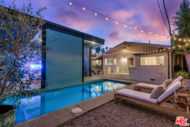 712 Woodlawn Avenue Venice, California A magical oasis consisting of a 1,573 sqft main house and potential 400+ sqft guest house on a highly coveted street in Venice, this newly remodeled Designer Craftsman mixes vintage charm w/ chic modern elegance. Be greeted by grand windows that let an abundance of light to shine throughout the lovely open floor plan. White finishes, sleek hardwood floors, & soaring windows cultivate a heavenly indoor/outdoor feel. Enjoy morning strolls on the beach, explore the trendiest restaurants & shopping on Abbot Kinney, or cook in the spacious renovated kitchen w/ stainless steel appliances & marble countertops. Enjoy maximum luxury in the master suite, w/ direct access to the tranquil backyard & sparkling salt water pool. Enveloped by lush landscaping and tall hedges, the incredible backyard space features a stunning modern mixed use space w/ floor to ceiling glass windows & dazzling view of the pool! Use the space as a creative studio, gym, or entertainment area. An enchanting home with endless potential, fall in love w/ this estate & its remarkable location!