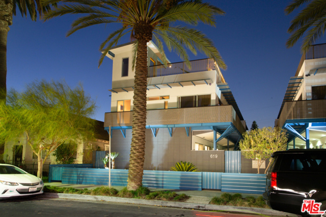 619 San Juan B Venice, California Luxury Townhome by award winning architect Howard Rosen. A modern live/work masterpiece in design; steel, wood, concrete & glass elements intersect in harmony creating an exceptional indoor/outdoor living environment of over 3050sqft. Lush courtyard leads to the direct access patio entry. 1st level w/exposed truss ceilings, concrete floors & dramatic light, open-concept kitchen w/custom cabinetry, dining, living room & den or 4th bed w/bath. 2nd level, a truly unique open-air patio offers outdoor living & dining w/coastal breezes. Natural light floods the master w/ensuite bath: soaking tub, shower & dual vanity. Two additional rooms are smartly designed as work spaces or guest rooms, w/bath. A floating staircase leads to the rooftop w/panoramic views of the city & sunsets. Conceptualized as a live/work environment, the flexible floor plan is ideal for tech entrepreneurs & creatives seeking an ideal work-from-home sanctuary in the heart of Silicon Beach. Stroll to famed Abbot Kinney.