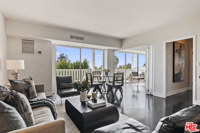 999 N DOHENY Drive 210 West Hollywood, California Gorgeous 2 bedroom/2 bath corner unit with expansive city views and radiant southern exposures. Most desirable layout at the prestigious Doheny West Towers. Ultra bright and open living space opens via sliders to a double length balcony overlooking city views and lush greenery over Beverly Hills. Move-in perfect with hardwood floors throughout, updated open kitchen with breakfast bar, master suite with west exposure on the corner (no common walls), spa bath and large walk-in closet with custom built-ins. Doheny West Towers is a full service building featuring a prize location walkable to the Sunset Strip, West Hollywood and Beverly Hills, and adjacent to the new Edition Hotel and Residences. Swimming pool and spa, fitness room, and gorgeous updated common areas and lobby. 24 hr concierge, guest parking and more. Hurry this will go fast!