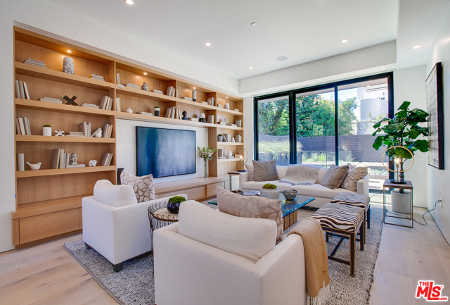 112 N Paloma Avenue Venice, California This truly creative and trend setting newly constructed home, is one of Venice's most spectacular residences, encompassing the best design, location and size. Situated on a charming walk street one block from the beach, this exceptional home boasts 5 bedrooms and 4.5 baths, totaling 3937 sqft. Oversized windows and innovative design, showcase the contemporary finishes and fittings, which include, custom cabinetry, Meile appliances, smart home technology and spectacular bespoke bathrooms filled with Calcutta marble. Additional features include an oversized entertainment floor, consisting of media area, bar, patio, and wine room, there are multiple outside areas, including an oversized rooftop deck, offering epic 360 views of the city, ocean and mountains, finally there is a two car garage. This one of a kind home offers modern, spacious, flexible living, steps from all that Venice has to offer.
