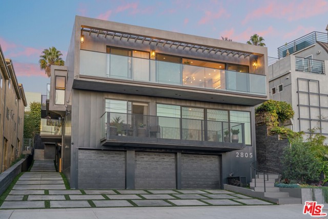 2805 3Rd Street Santa Monica, California Ocean 8 is a stunning 8-unit apartment building located in prime Santa Monica, CA. Newly redeveloped, the property consists of four two-bedroom, one-and-a-half-bathroom, two two-bedroom, two-bathroom, and two three-bedroom, two-bathroom units. Designed by award-winning Griffin Enright Architect, the stylish boutique building offers luxury living and a modern feel. The exterior is finished in a combination of concrete and steel and with subtle landscaping, tiled walkways, and lighting complimenting the look. Each unit features either a balcony, yard, or private deck with panoramic ocean views in select units. The property showcases ultra-clean lines and spacious, open floor plans. Units are equipped with brand-new appliances including a family hub smart refrigerator, gas range convection oven, and Caesarstone countertop. The bathrooms feature wall-mounted toilets, modern LED-lit vanities, wall-to-wall/ceiling porcelain tiling, and linear drains. Additionally, the bedrooms have custom-made wall-to-wall built-in closets and the living area contains a built-in tv and fireplace. Ocean 8 also offers state-of-the-art smart home technology including wifi thermostat, app-controlled lighting, Doorbird video intercom system, and security cameras throughout the building.