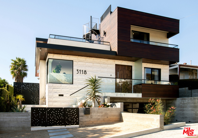 3118 18Th Street Santa Monica, California 2020 Ultra High-End Designer 4,103 sq ft 4BR/6BA + Office/Media Room Masterpiece w/ spectacular resort-style indoor/outdoor living & sweeping 360 degree ocean & mountain views in an A+ Santa Monica Location. An entertainer's dream. Portuguese White Ivory limestone facade & custom Walnut pivot entry open to a fantastic light-filled open concept living space w/exquisite 10+ ft ceilings & the highest end finishes throughout. Sleek chefs kitchen w/top of the line Sub Zero & Wolf appliances, Avalon marble countertops & bkfst bar w/ distressed granite. Living/dining/family feature polished white porcelain slab flooring, LED lighting & impressive Brazilian granite fireplaces. Master suite w/ black Venetian plaster fireplace, ocean view walk-in closet & bath w/ walk in steam shower & stand-alone soaking tub. 2nd level w/ stunning walnut flooring & all BRs feature balconies.w/ porcelain tiles. Large Upstairs Laundry room. Show stopping roofdeck & separate ocean view spa deck. And so much more!