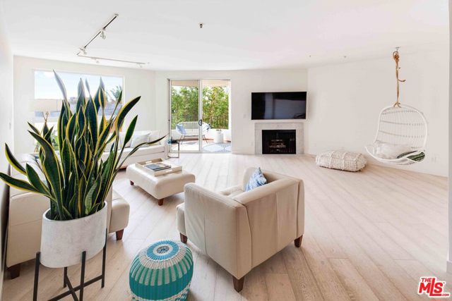 235 Main Street 219 Venice, California Signature Venice Beach style, one block to the sand. This Modern, private West-facing 2 bedroom corner unit in the exclusive, award-winning Venice Renaissance is graced with abundant natural light and fresh ocean cross breezes. Designer owned and artfully re-imagined, highlights include: open concept living and dining, private outdoor spaces, gallery walls, a cook's kitchen with European appliances and gorgeous oak floors throughout. Luxurious bedroom suite with chic spa bath, walk-in closet and private patio. Full size washer/dryer in unit. 2 designated parking spaces in secure garage. A relaxing pool & spa, sundeck, security, storage and generous guest parking for visiting friends and family. This beach dream offering is located on the Venice/Santa Monica border, an ideal location, surrounded by shops and restaurants on Main Street, Abbot Kinney, Rose Ave. and just steps to the Pacific. Live where everyone wants to visit! Also available for lease $5500 per month.
